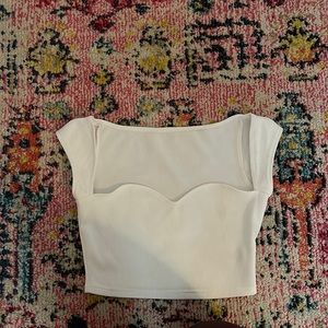 White little top. Cropped with detailing